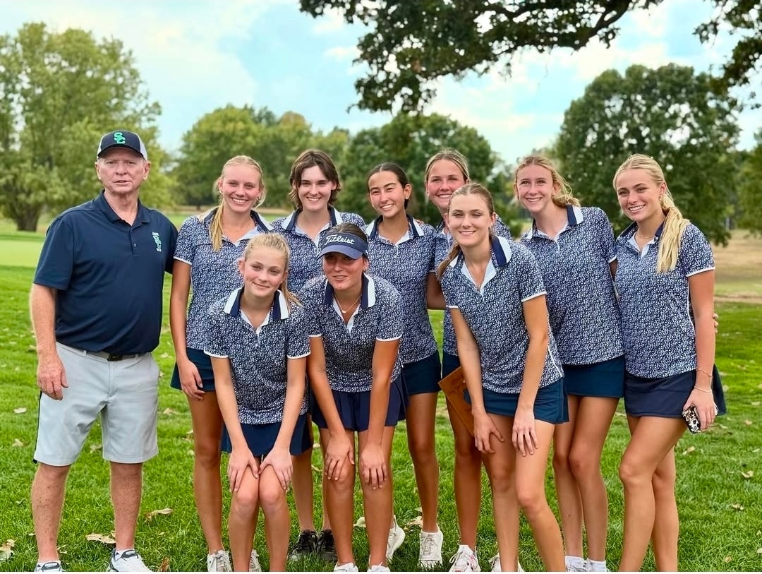 Springfield Catholic girls golf team poses together on the course